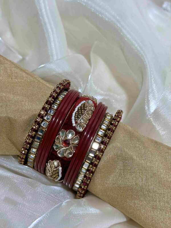 Luxurious Maroon and Gold Bangle Set with Intricate Embellishments - Image 3
