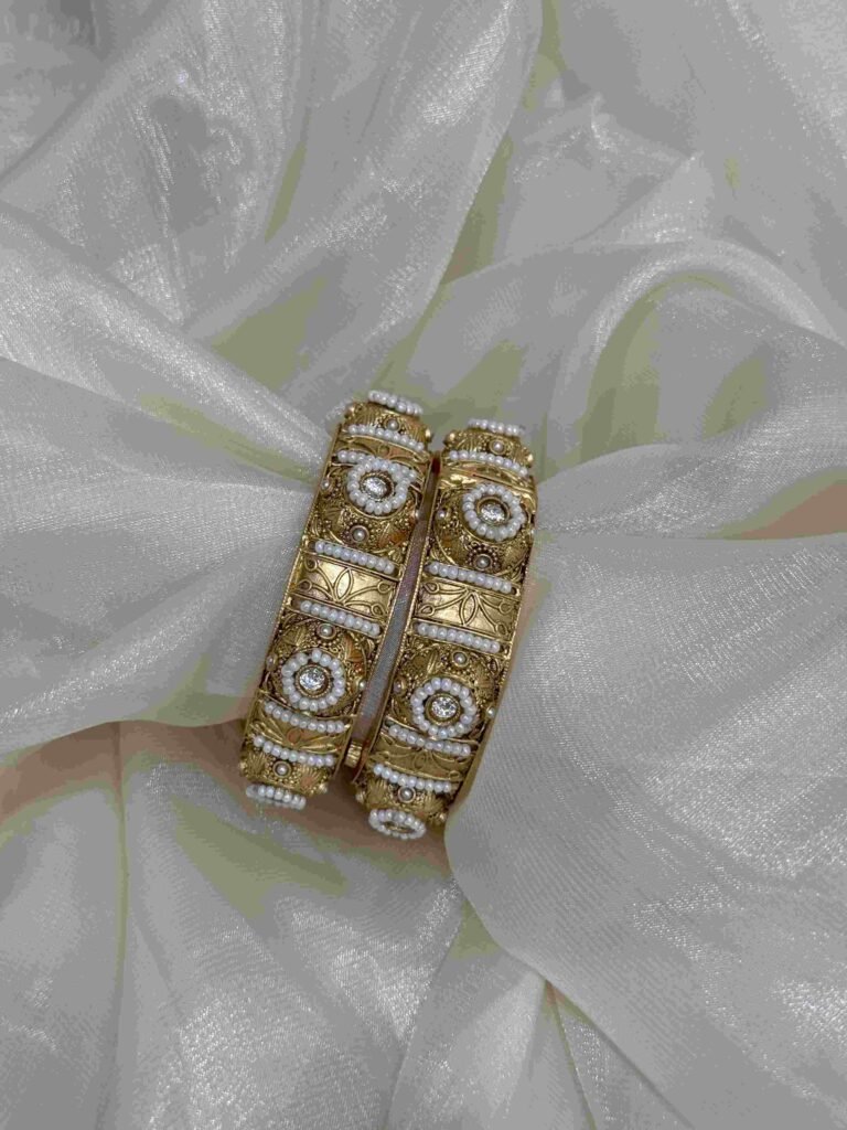 Rajwadi Gold and White Stone Bangles