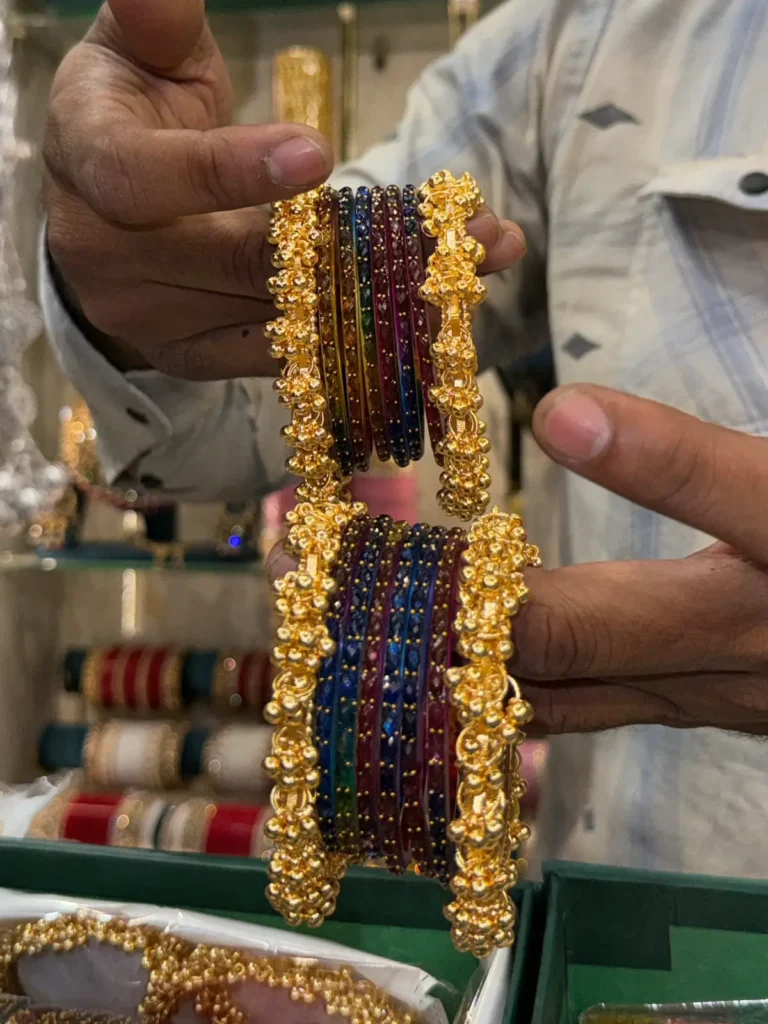 Royal Multi-Color Glitter Bangle Set (with Gold Jhumki Finish)