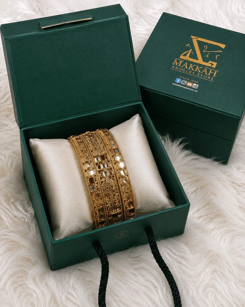 Luxury Rajwadi Bridal Bangles – Gold Polish with Ruby & White Stone Design